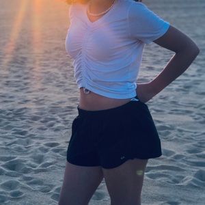 White athletes work out crop top